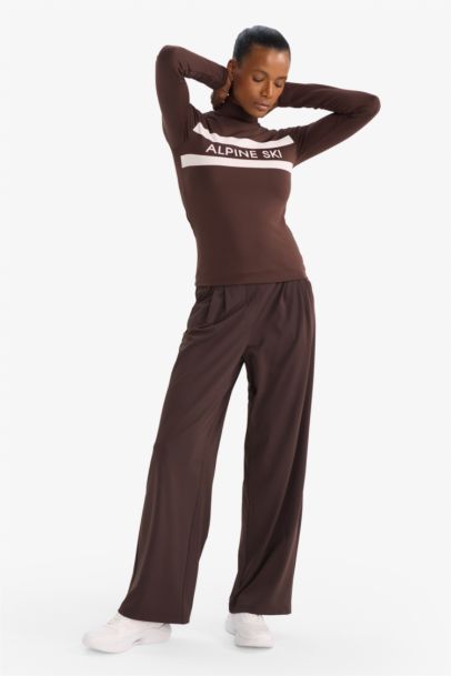 Pantalon de sport longueur cheville et jambes larges