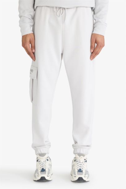 بنطلون سويت بانتس جوجر قماش سكوبا قصة عادية من DeFactoFit NBA