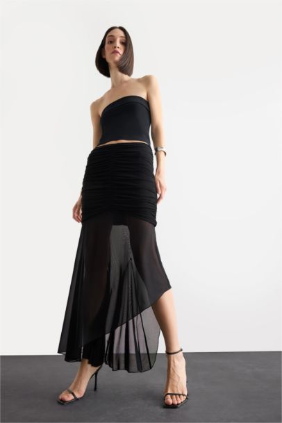 تنورة ميدي غير متماثل بكسرات