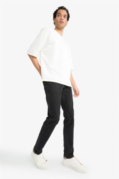 بنطلون جينز كارلو سكيني فيت برجل ضيق وخصر عادي