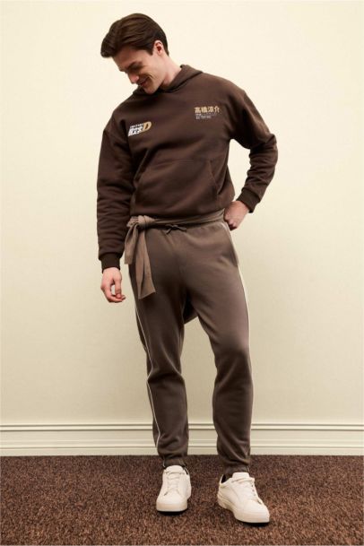 سويت شيرت مطبوع أوفر سايز بغطاء للرأس