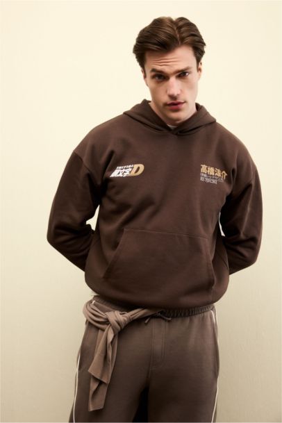 سويت شيرت مطبوع أوفر سايز بغطاء للرأس