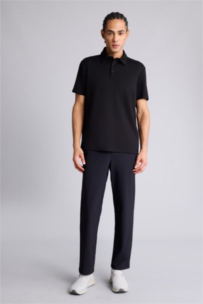 تيشيرت بولو رياضي منسوج قصة عادية من DeFactoFit