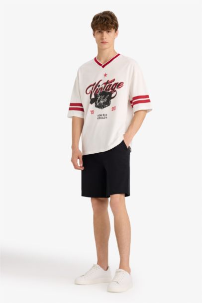 تيشيرت نص ردن قصة فضفاضة بياخة مستديرة