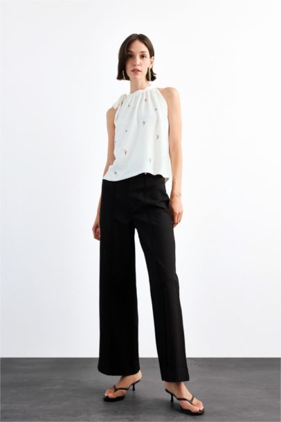 بلوزة نص ردن بياخة مستديرة