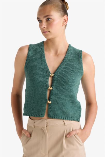 Gilet en tricot à col en V et boutons Coupe ajustée