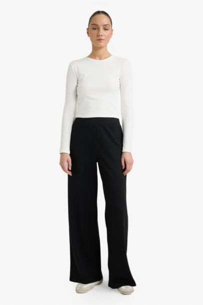 Pantalon en piqué à jambes larges