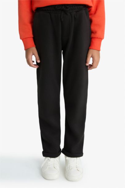 Pantalon de survêtement droit en piqué à taille élastique pou garçon