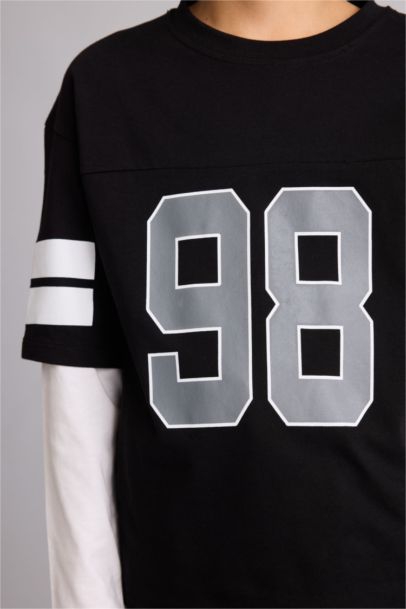 تيشيرت ولادي قصة عادية وطبعة شعار