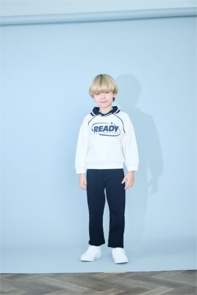 سويت شيرت بيبي ولادي بطبعة شعار قصة عادية