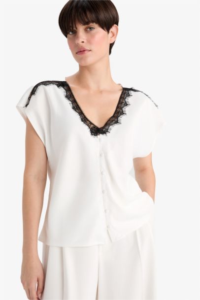 قميص ستان قصة عادية بياخة V