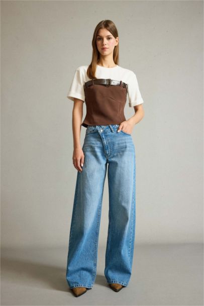 بلوزة نص ردن بياخة مستديرة