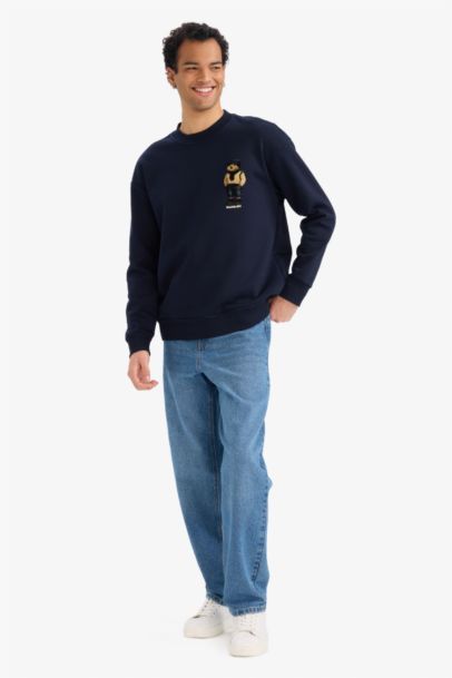 سويت شيرت مطبوع أوفر سايز بياقة مستديرة