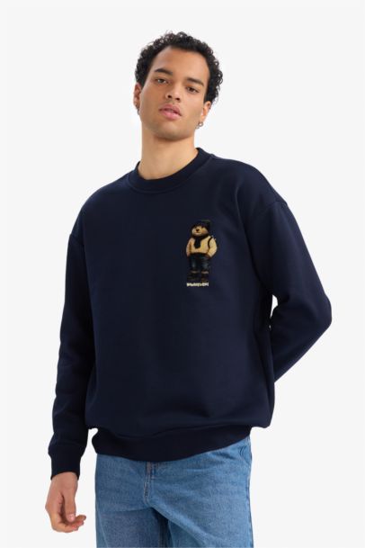 سويت شيرت مطبوع أوفر سايز بياقة مستديرة