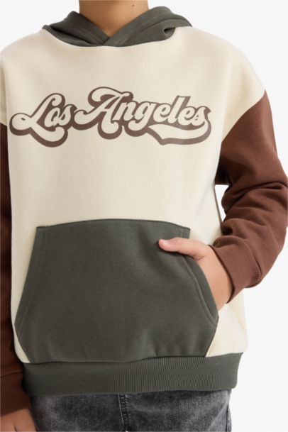 سويت شيرت ولادي اوفر سايز مطبوع بجيب وبطانة ناعمة