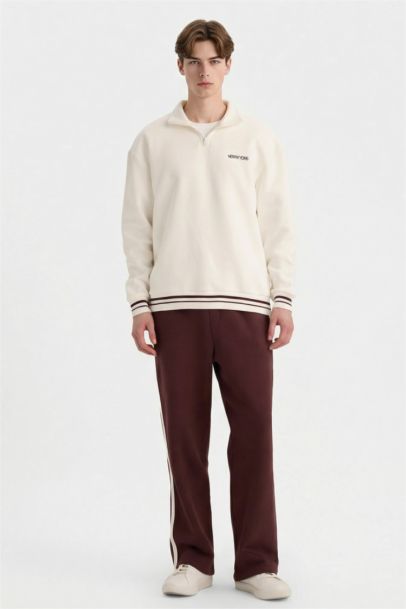 سويت شيرت بطبعة شعار اوفر سايز بياخة عالية بنصف سحاب