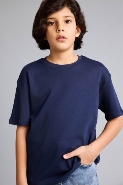 تيشيرت ولادي نص ردن اوفر سايز بياخة مستديرة