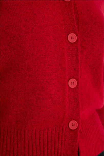 سترة قصة عادية برقبة مستديرة وأزرار