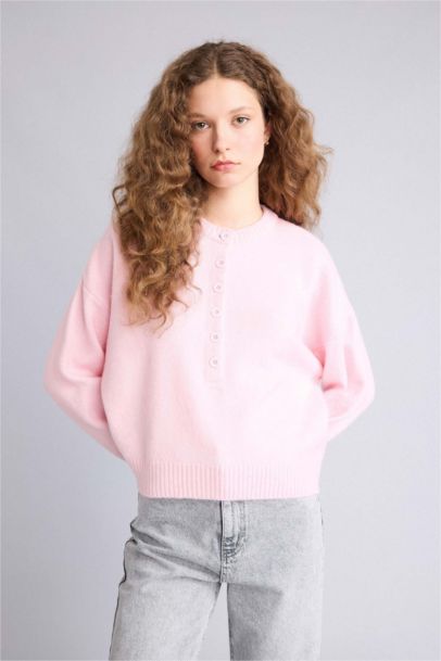 بلوز تريكو قصة عادية بياخة مستديرة