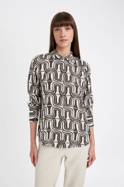 قميص ردن طويل قصة عادية منقوش