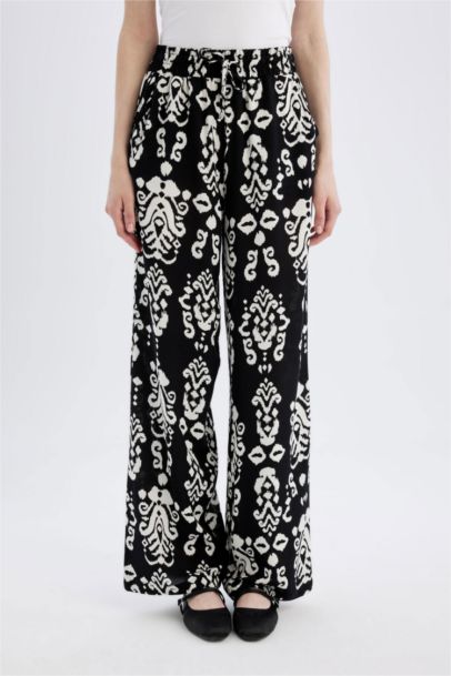 بنطرون فلورايدا وايد ليج برجل واسع بجيب وخصر عالي