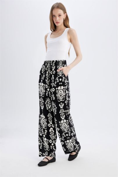 بنطرون فلورايدا وايد ليج برجل واسع بجيب وخصر عالي