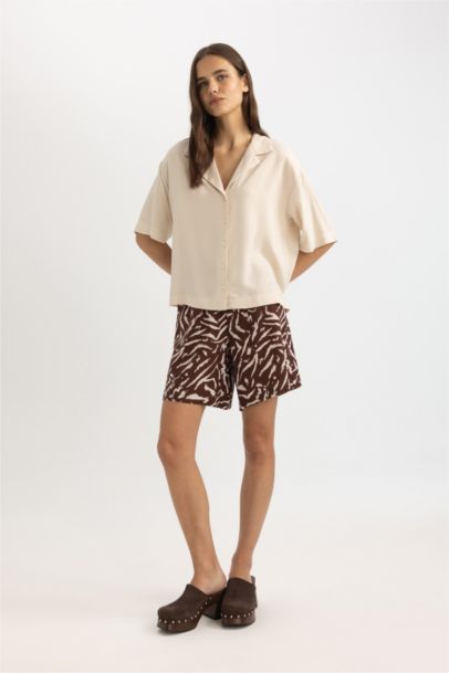 شورت قصة مريحة بخصر عالي برجل واسع