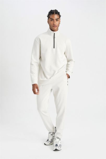 بنطلون بجامة رياضي سليم فيت من DeFactoFit