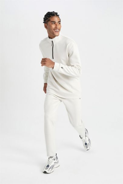 بنطلون بجامة رياضي سليم فيت من DeFactoFit