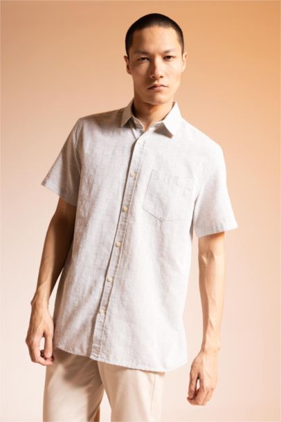 Chemise à col polo et manches courtes 100% coton