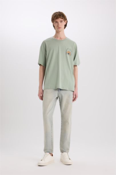 %100 Pamuk Oversize Geniş Kalıp Bisiklet Yaka Sırt Baskılı Kısa Kollu Tişört