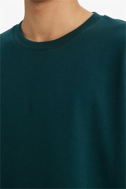 تيشيرت نص ردن اوفر سايز قماش يسمح بمرور الهواء