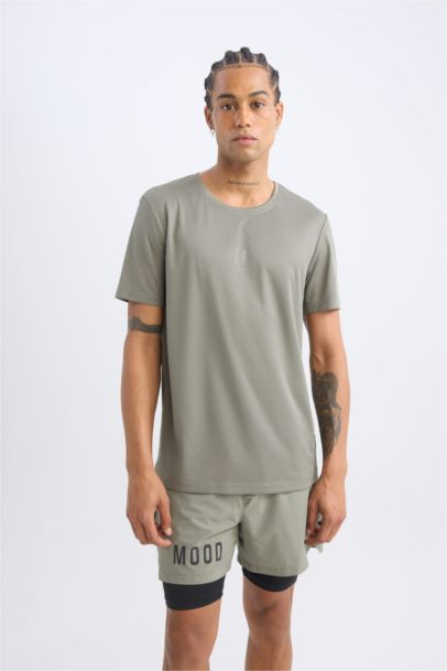 تيشيرت رياضي سليم فيت نص كم برقبة مستديرة من DeFactoFit