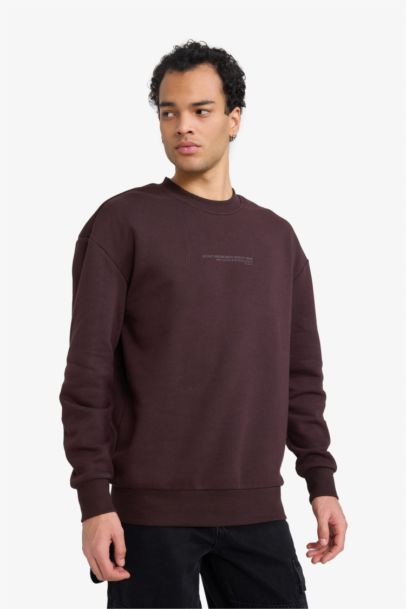 سويت شيرت اوفر سايز برقبة مستديرة