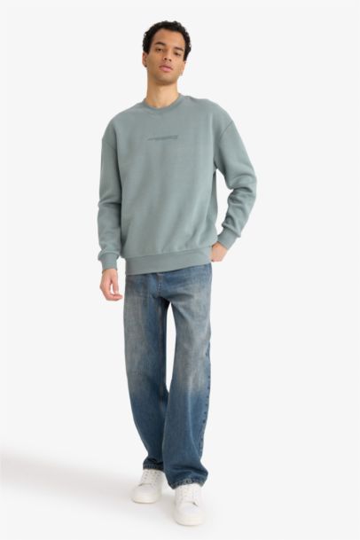 سويت شيرت اوفر سايز برقبة مستديرة وطبعة