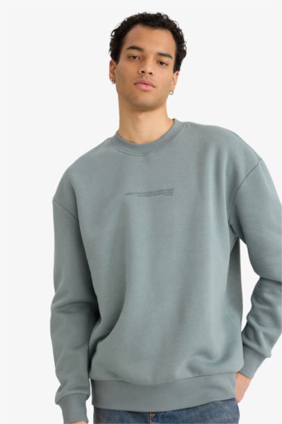 سويت شيرت اوفر سايز برقبة مستديرة وطبعة