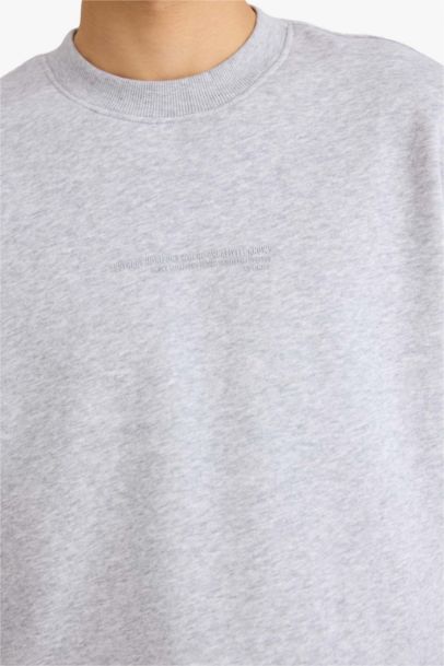 سويت شيرت اوفر سايز برقبة مستديرة مطبوع