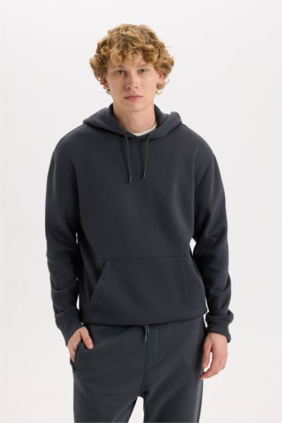 سويت شيرت قصة عادية بكابيشون بجيب