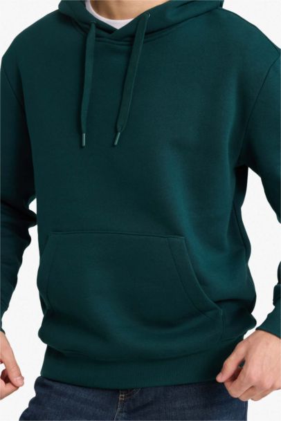 سويت شيرت قصة عادية بكابيشون بجيب