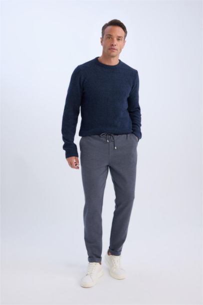 Брюки джоггеры с отворотами из легкой летней ткани