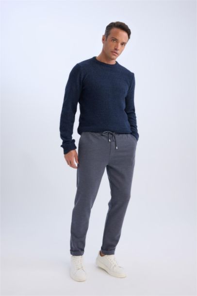 Брюки джоггеры с отворотами из легкой летней ткани