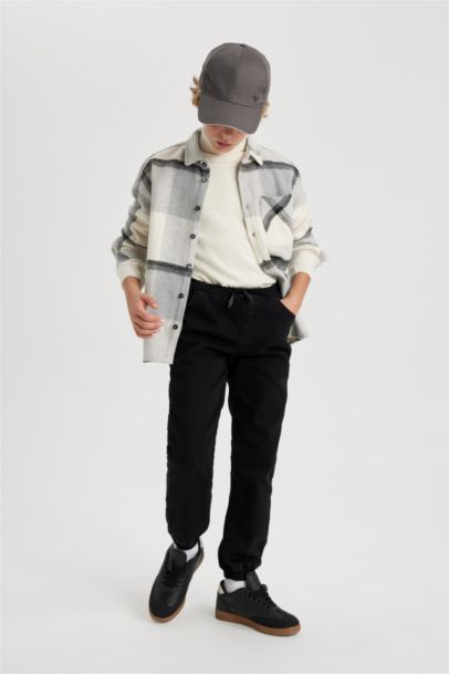 بنطلون جينز جوجر اولادي بأستك من تحت وبطانة صوفية أسود