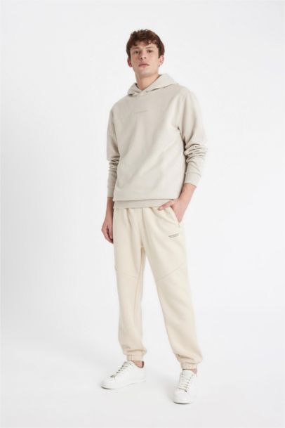 بنطلون بجامة رياضي قصة عادية بجيب ورجل مطاطي