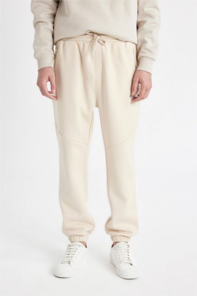 بنطلون بجامة رياضي قصة عادية بجيب ورجل مطاطي