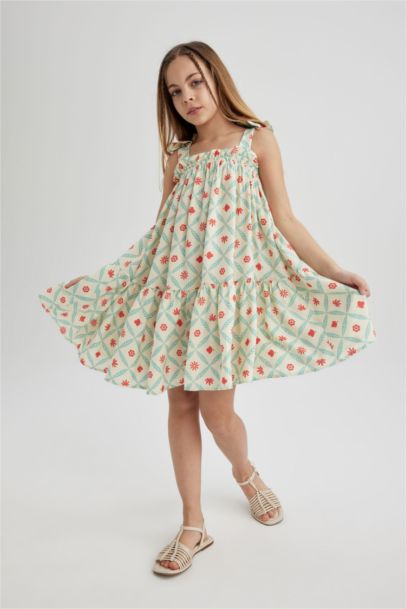 فستان بناتي منقوش بحمالات