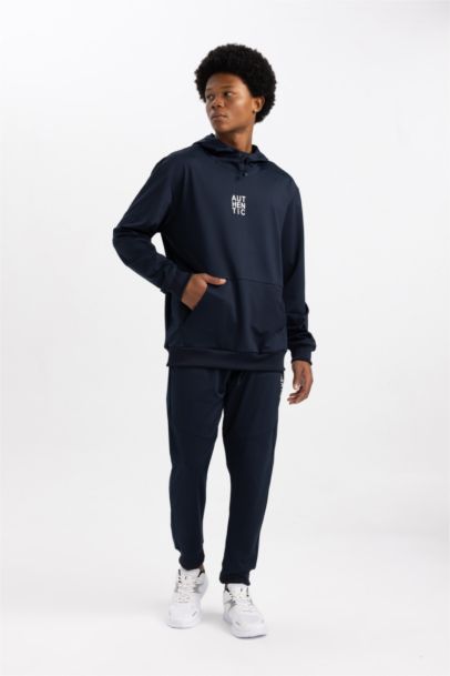 بنطلون بجامة رياضي بريميوم سليم فيت برجل مطاطي من DeFactoFit