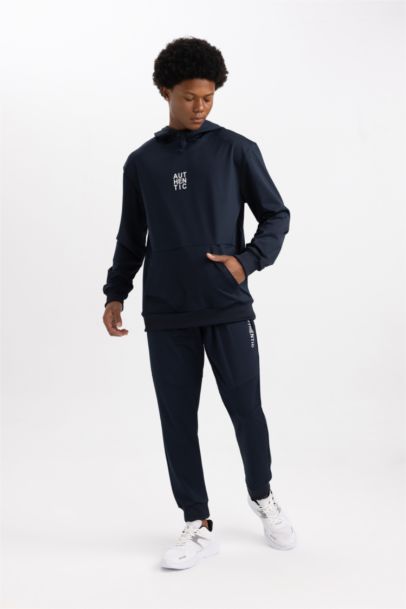 بنطلون بجامة رياضي بريميوم سليم فيت برجل مطاطي من DeFactoFit