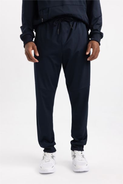 بنطلون بجامة رياضي بريميوم سليم فيت برجل مطاطي من DeFactoFit