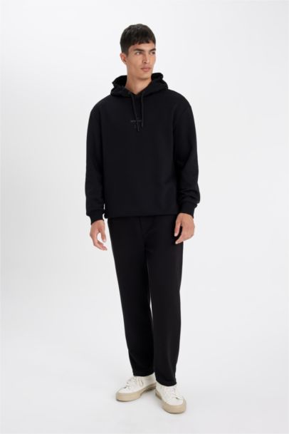 سويت شيرت قصة مريحة بغطاء للرأس