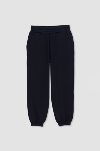 Pantalon Jogging en tissu scuba à poches plaquées